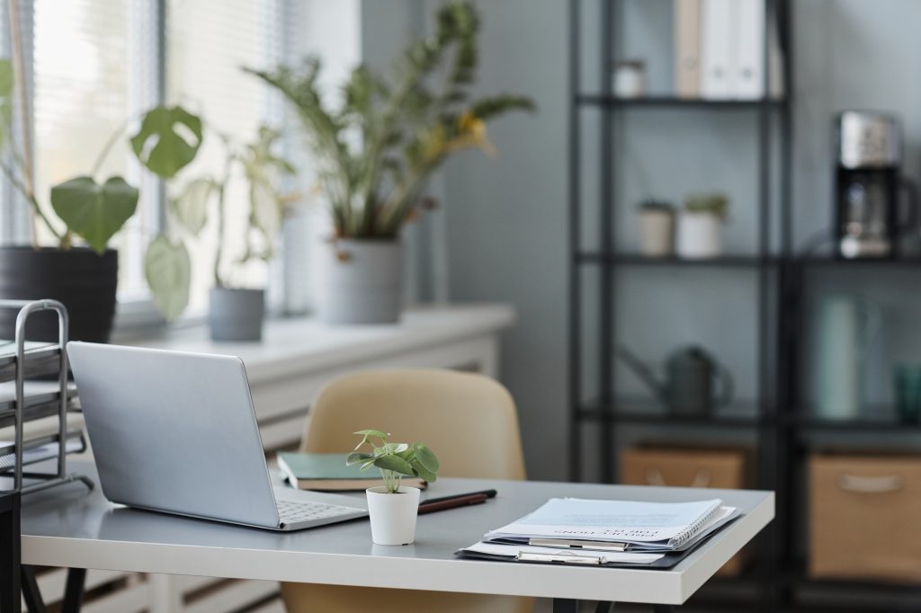 Workplace with laptop at office